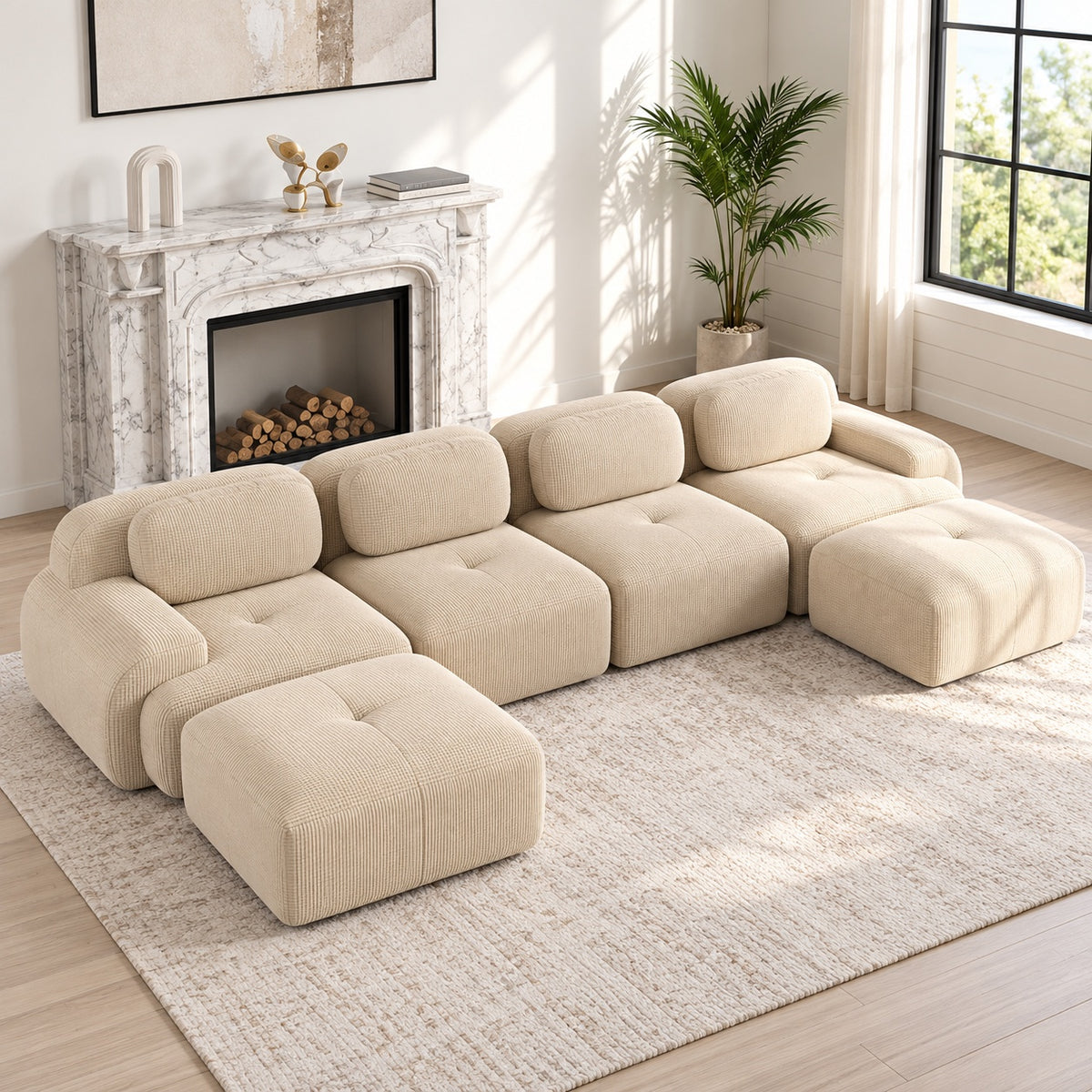 Canapé Grenade 4 places en velours côtelé beige avec 2 poufs en situation dans un salon