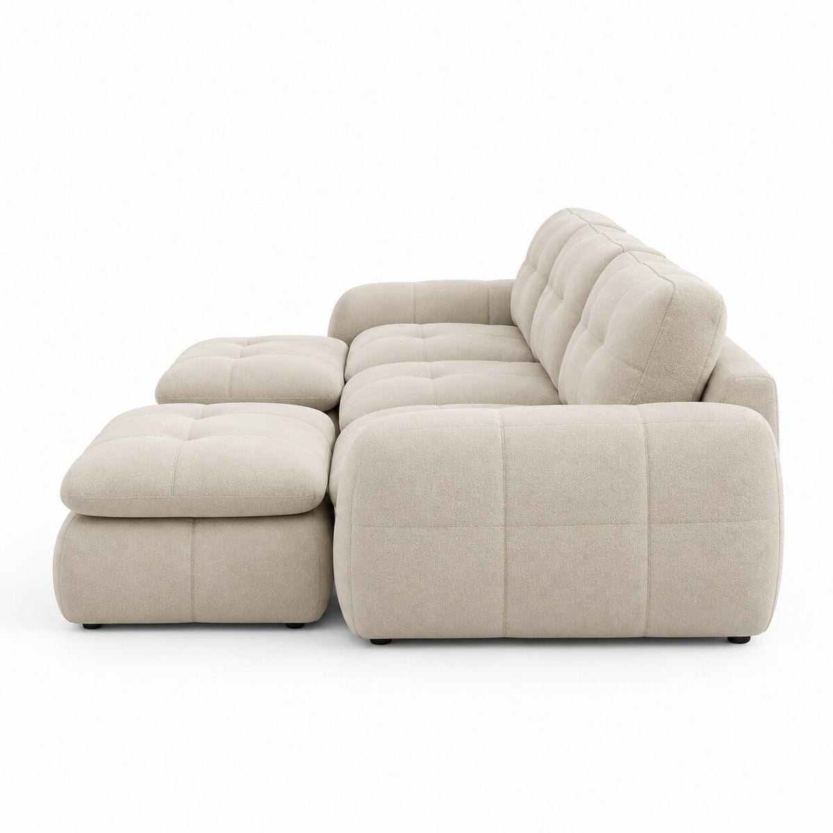 Canapé modulable Ronda 3 places beige avec deux poufs, vue de profil